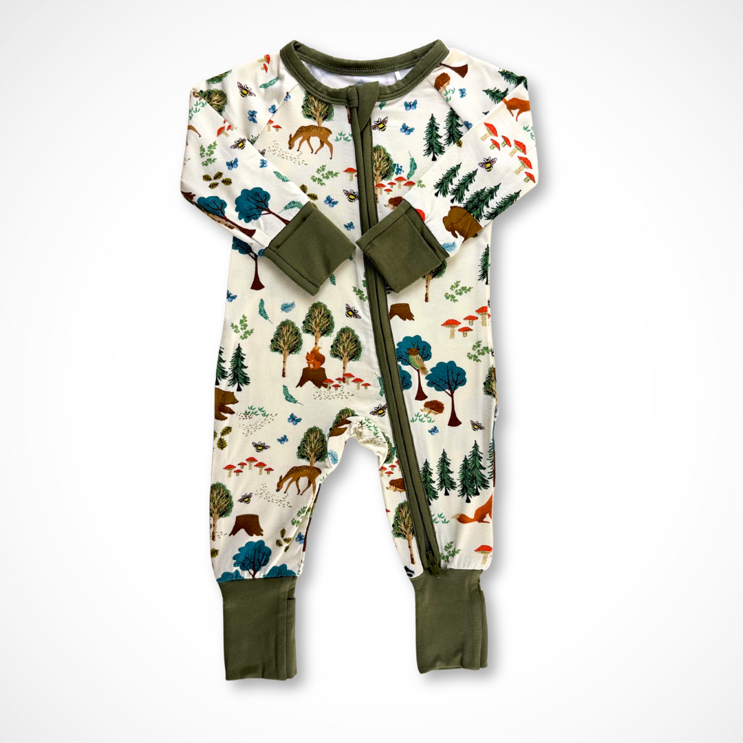 Baby one-piece zip footie pajama in bamboo fabric with whimsical In the Woods woodland print and fold-over cuffs