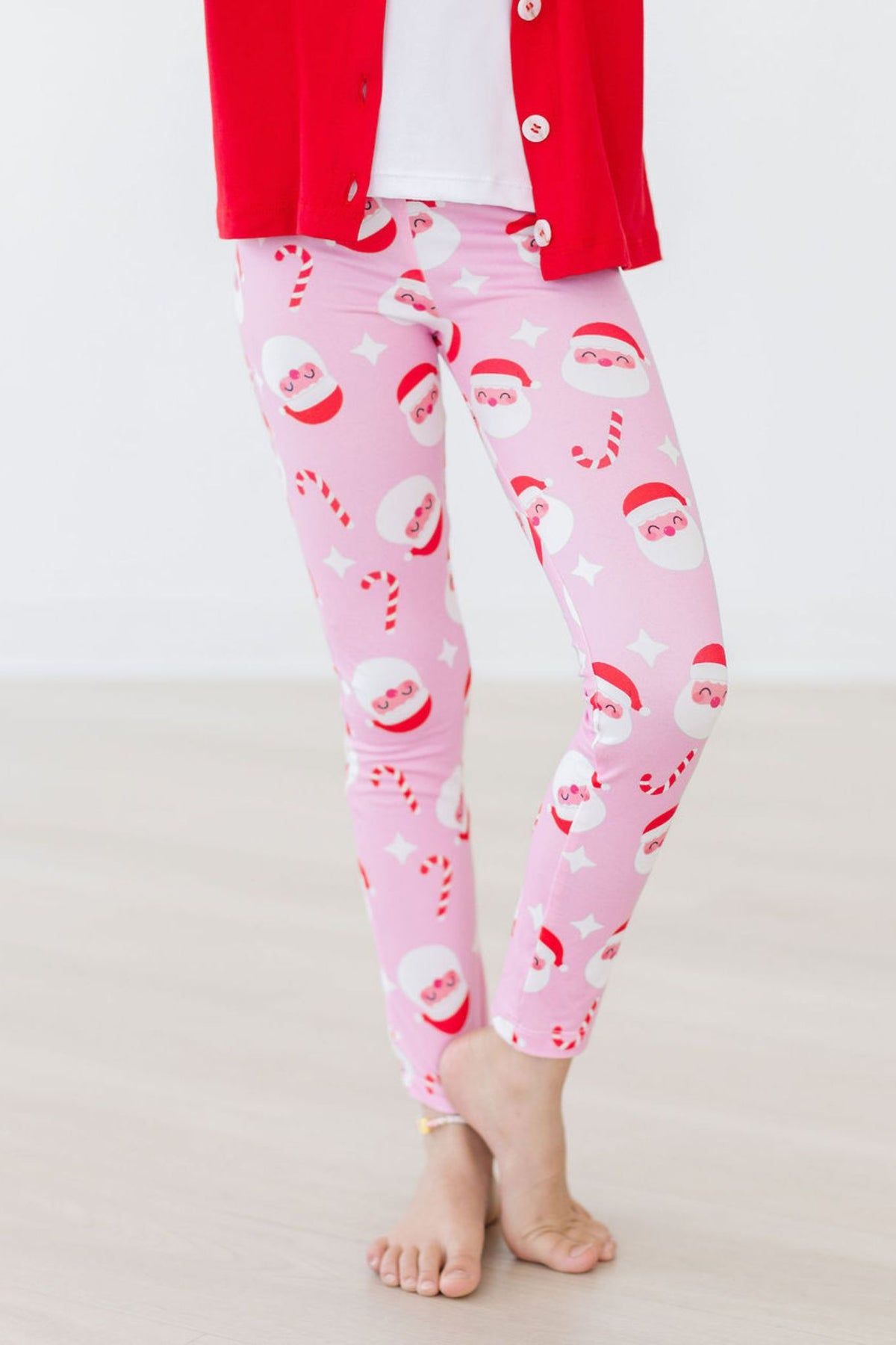 Mila & Rose organic baby Jingle Bells leggings, festive print.