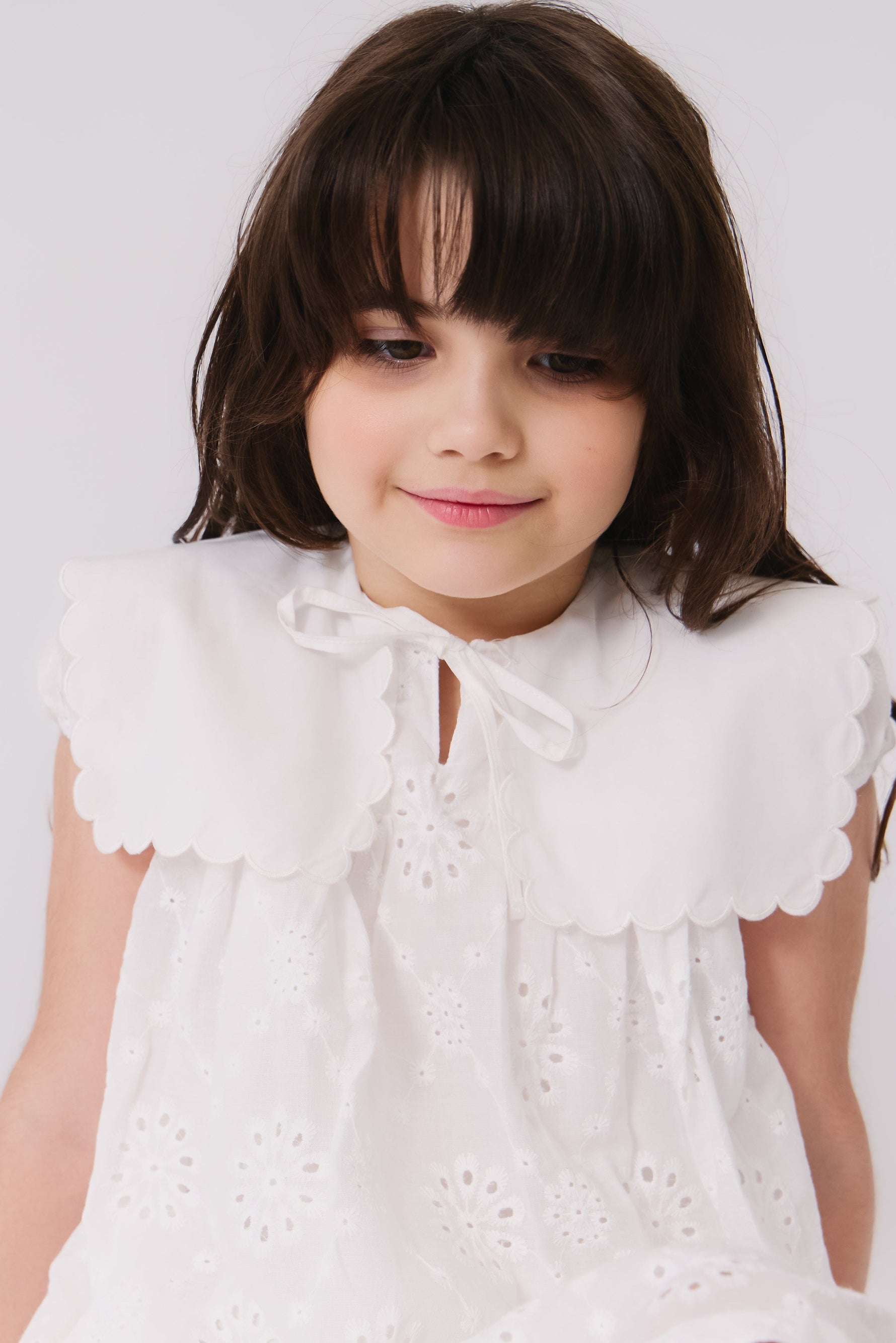 KIPP Collection Eyelet Dress With Ruffled Collar And Tie Detail For Girls by KIPP™ Collection at Everetts Place