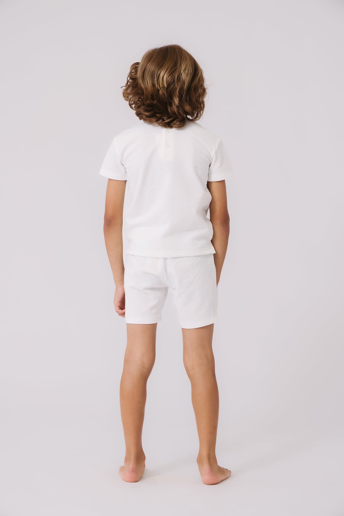 KIPP Collection Elasticized Textured Shorts with Double Button Detail for Women by KIPP™ Collection at Everetts Place