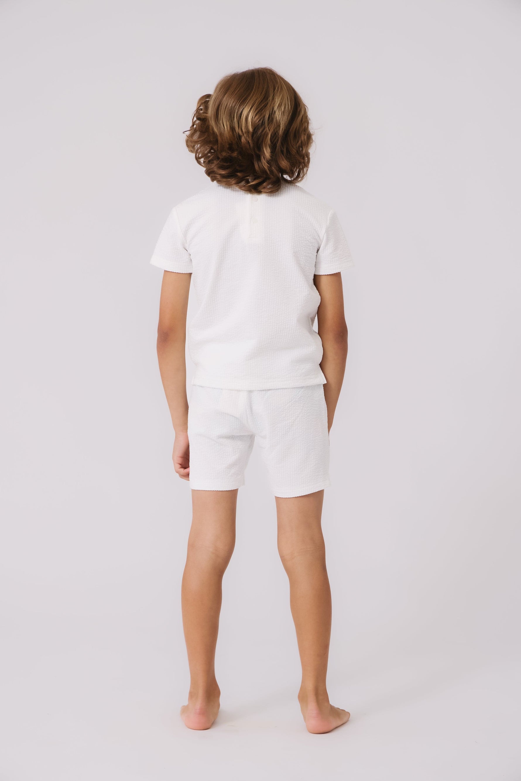 KIPP Collection Elasticized Textured Shorts with Double Button Detail for Women by KIPP™ Collection at Everetts Place