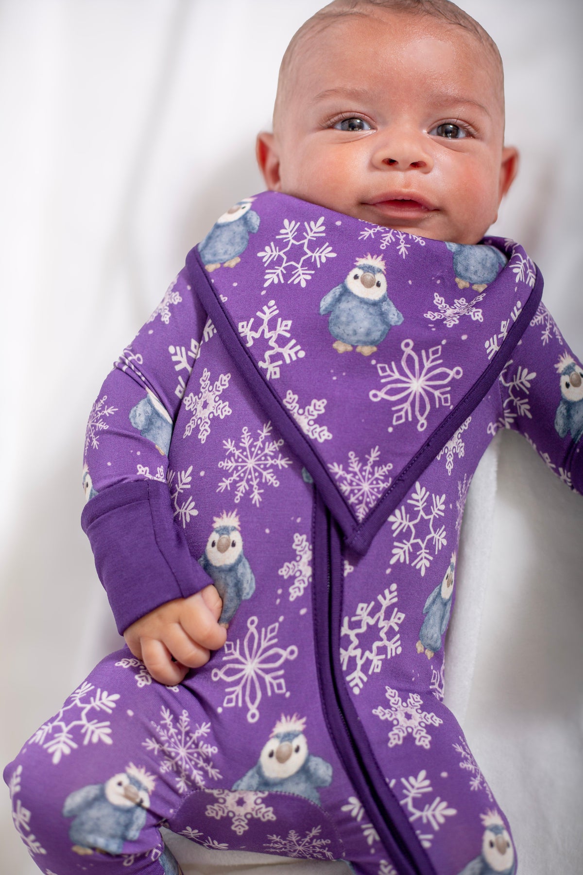 My First Snow Fall: Penguin Bamboo Bib In Purple & Gold by Rayn’s Tiny Stitches