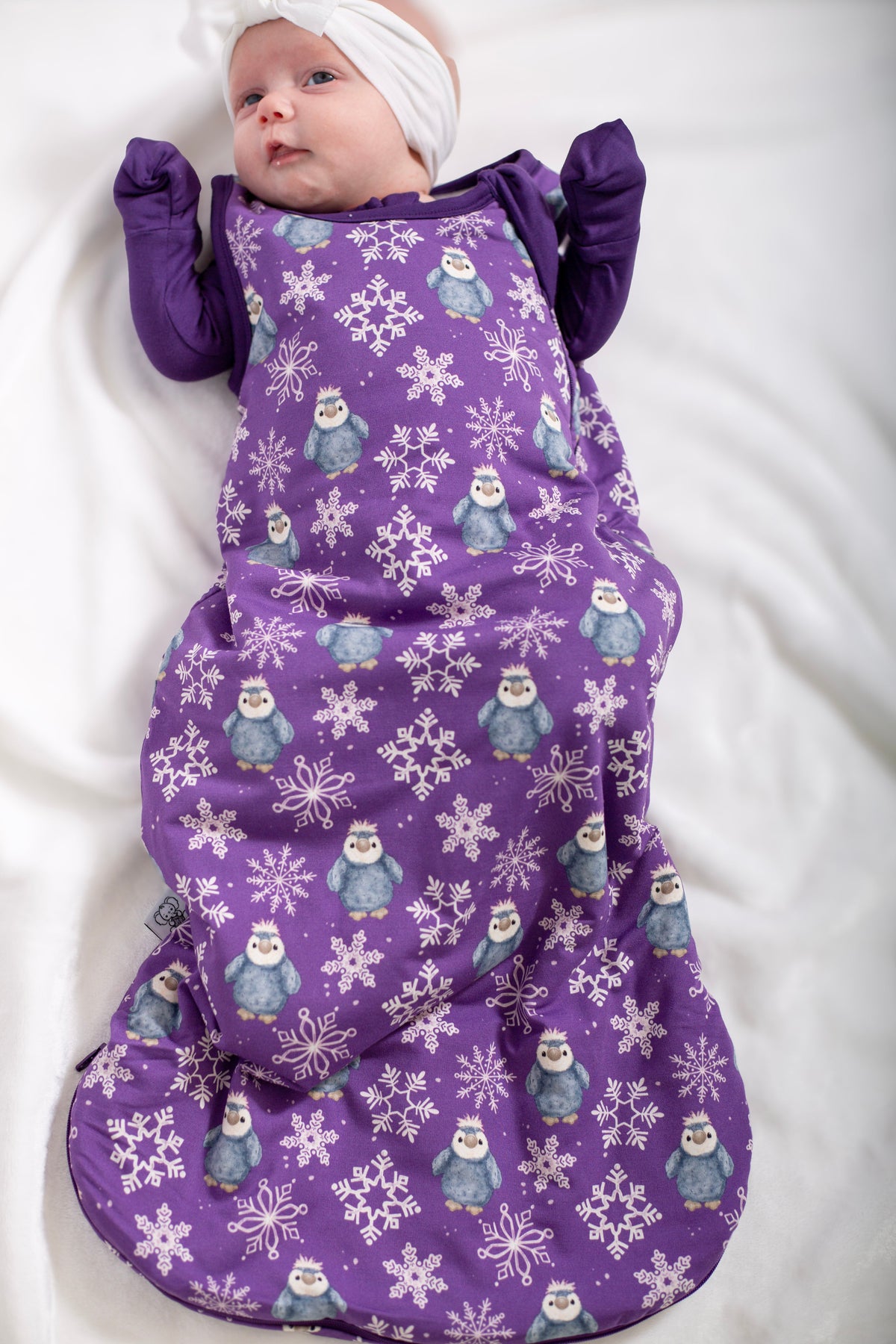 My First Snow Fall - Penguin Sleep Sack In Purple & Gold by Rayn’s Tiny Stitches