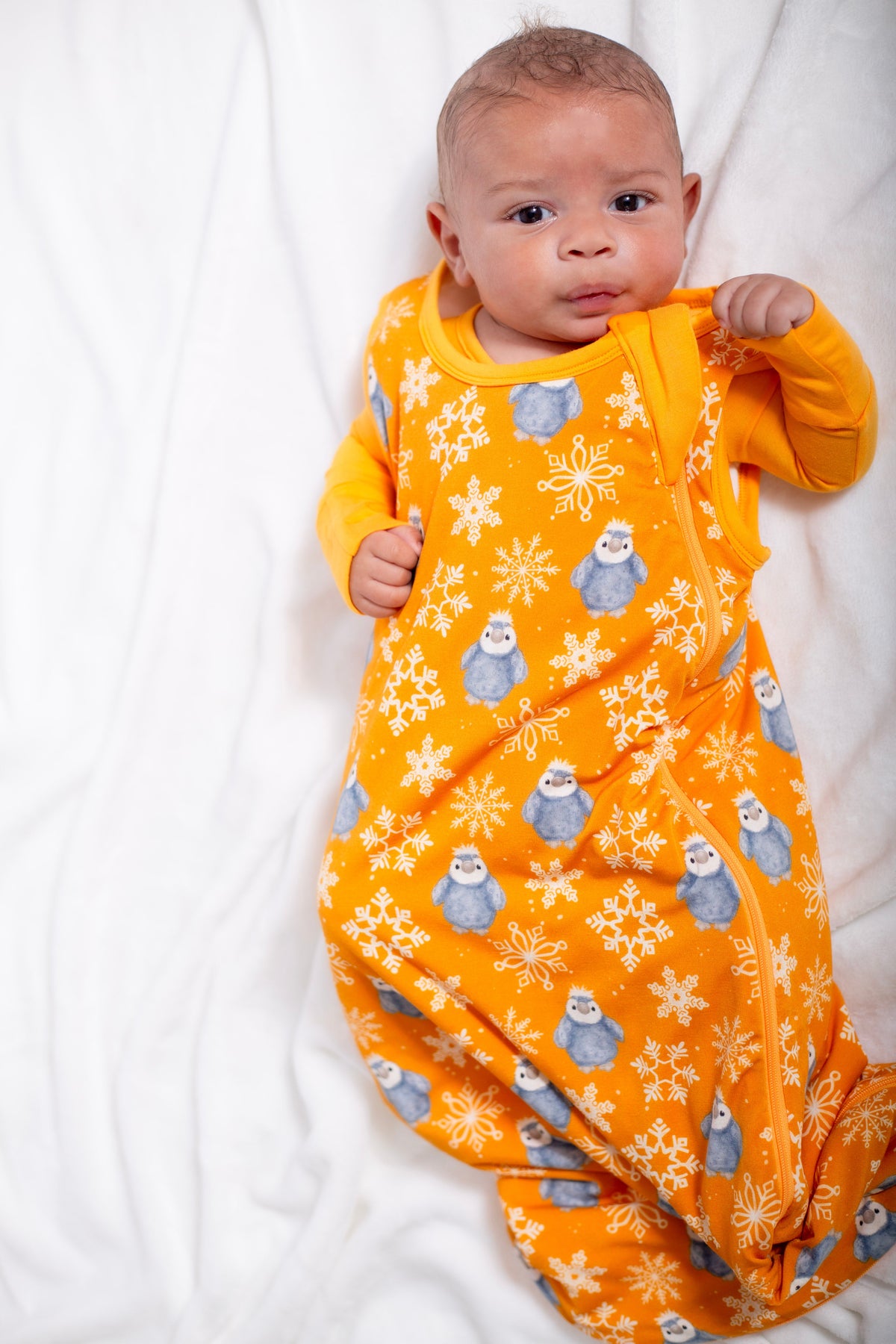 My First Snow Fall - Penguin Sleep Sack In Purple & Gold by Rayn’s Tiny Stitches