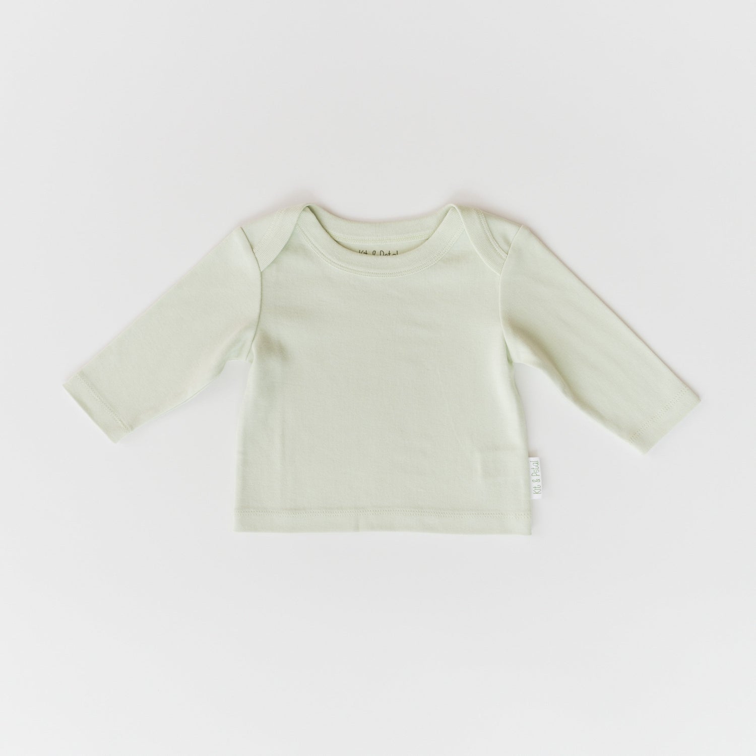 Long sleeve baby shirt in leafy green with an envelope neckline