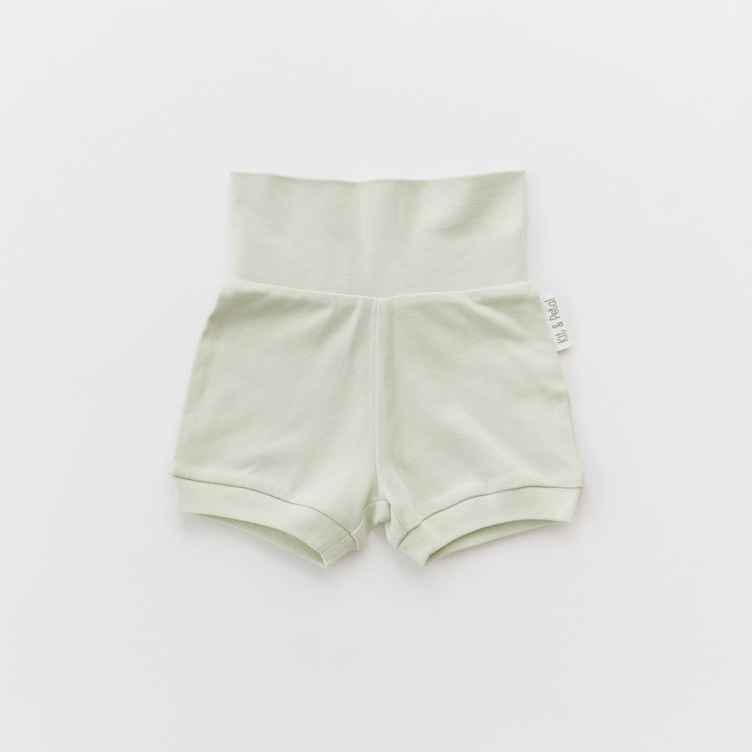 Fold-over baby shorts in leafy green with a wide fold-over waistband