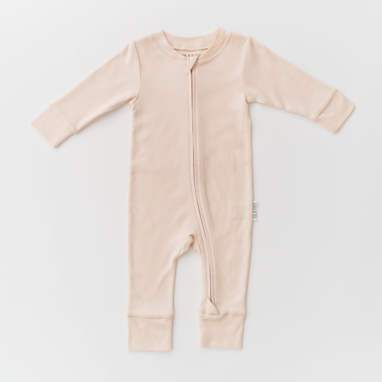 Long sleeve baby romper in rosy peach with a full-length two-way zipper