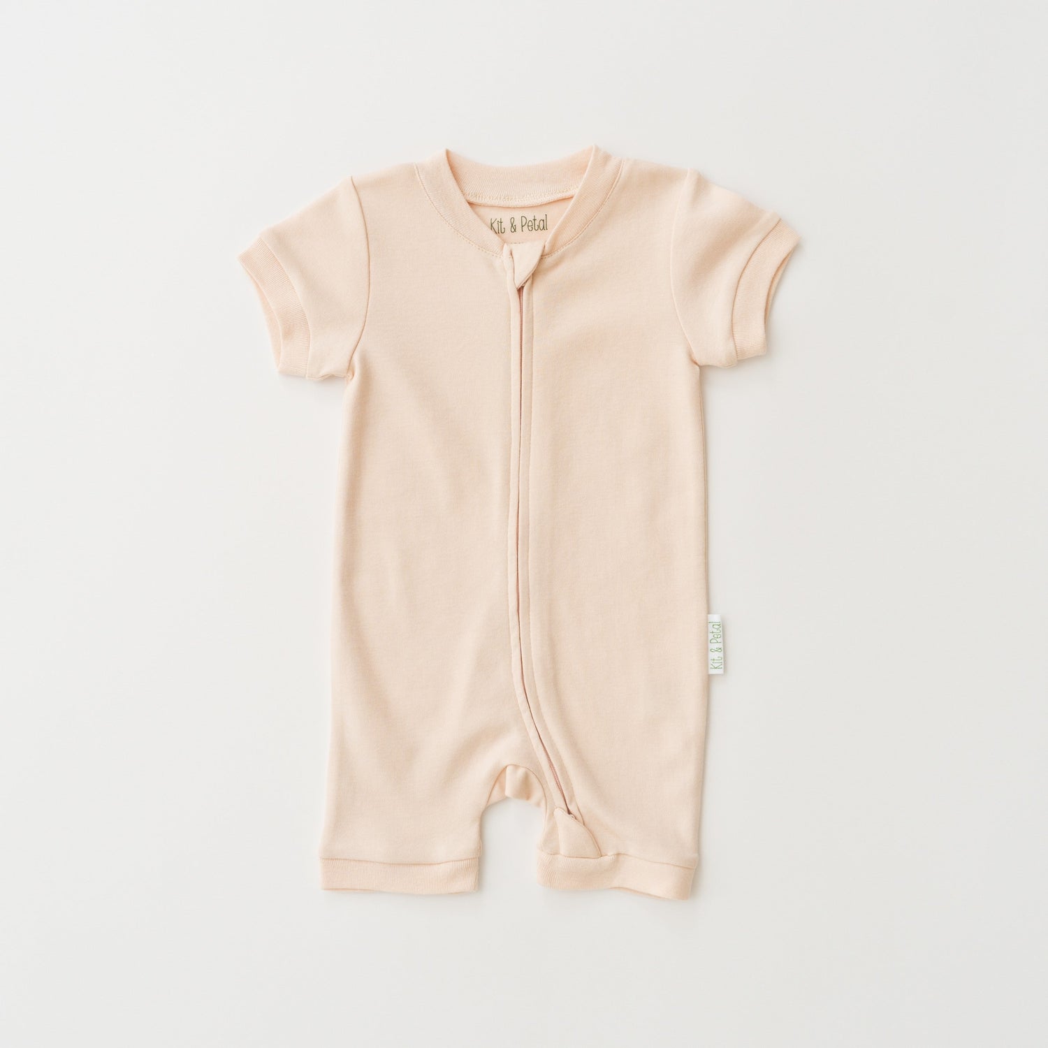 Short sleeve baby romper in rosy peach with a front two-way zipper