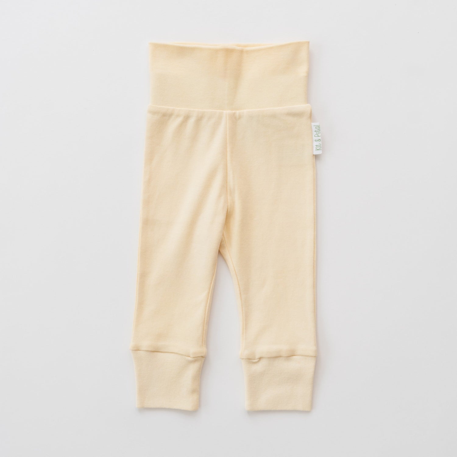 Fold-over baby pants in sunny yellow with a wide fold-over waistband