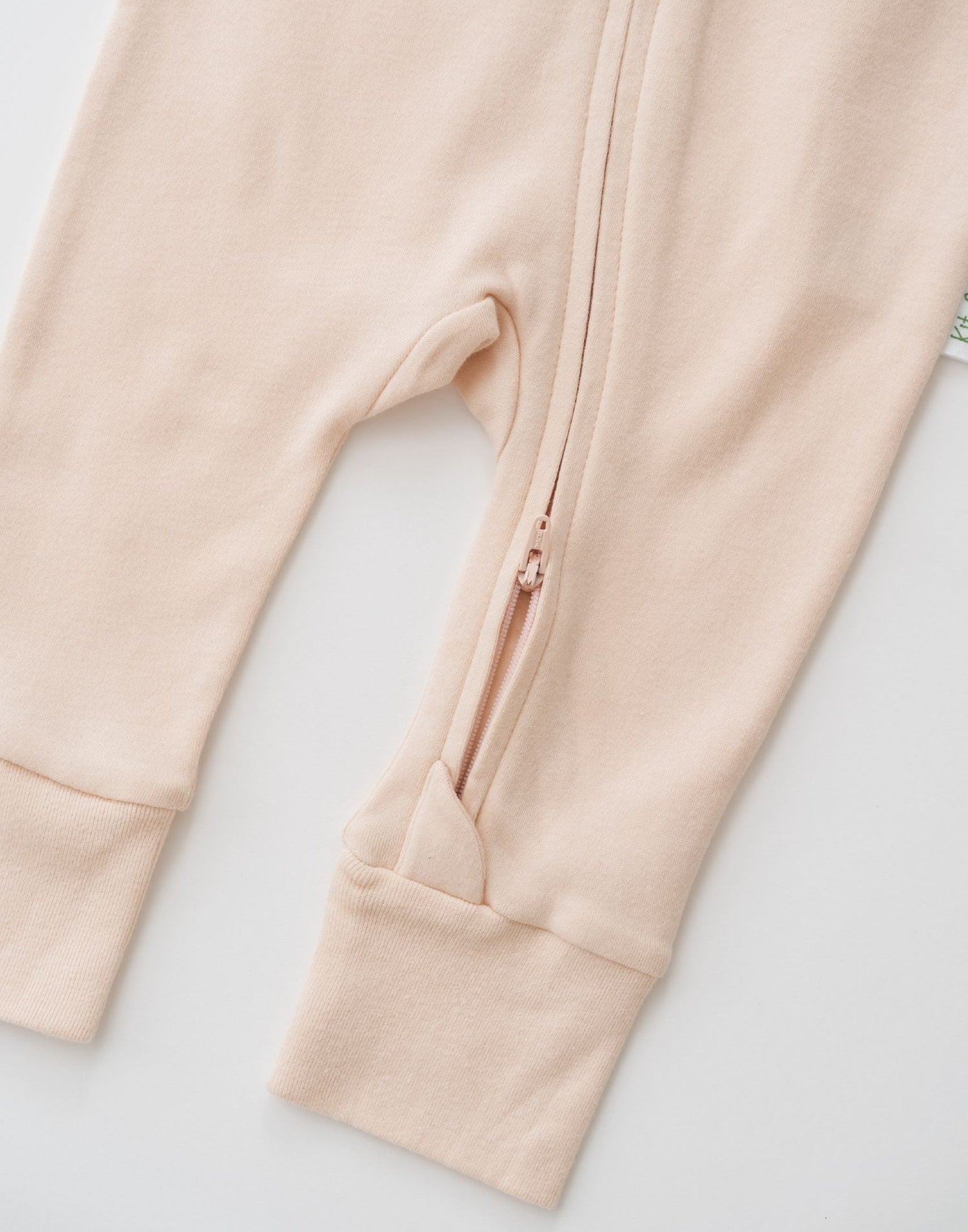 Long Sleeve Romper in Rosy Peach