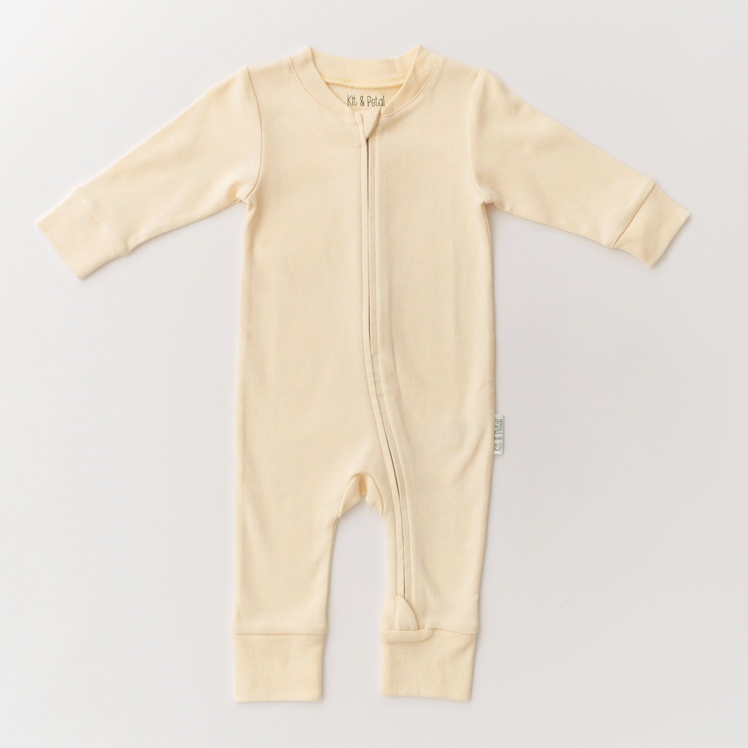 Sunny yellow long sleeve baby romper with a full-length two-way zipper down the front