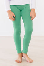 Mila & Rose soft, vibrant Kelly green baby leggings.