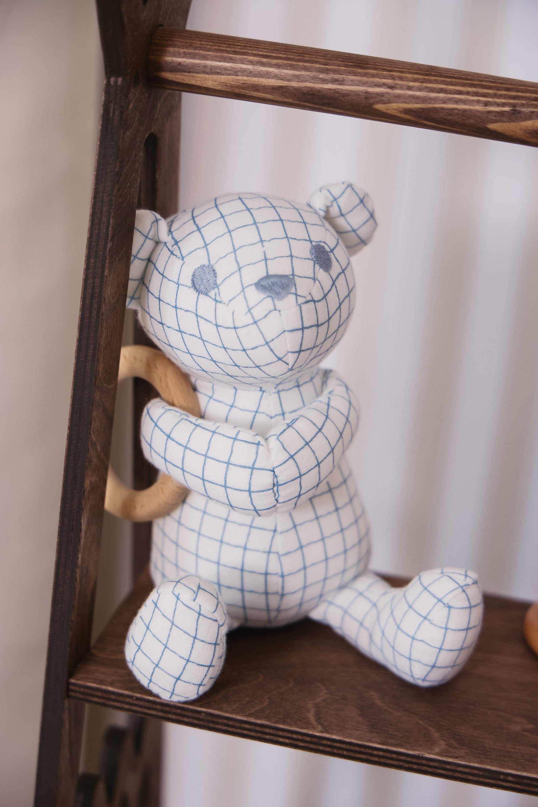KIPP Collection Plush Bear Toy with Grid Print and Wooden Ring for Babies by KIPP™ Collection at Everetts Place