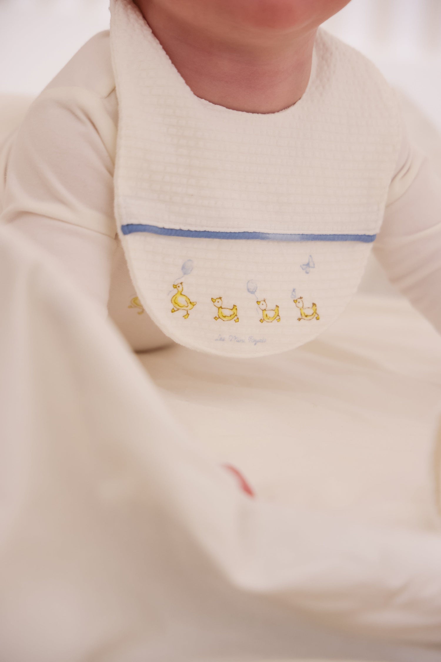 KIPP Collection Baby Bib With Blue Embroidered Detail And Snap Closure For Baby by KIPP™ Collection at Everetts Place