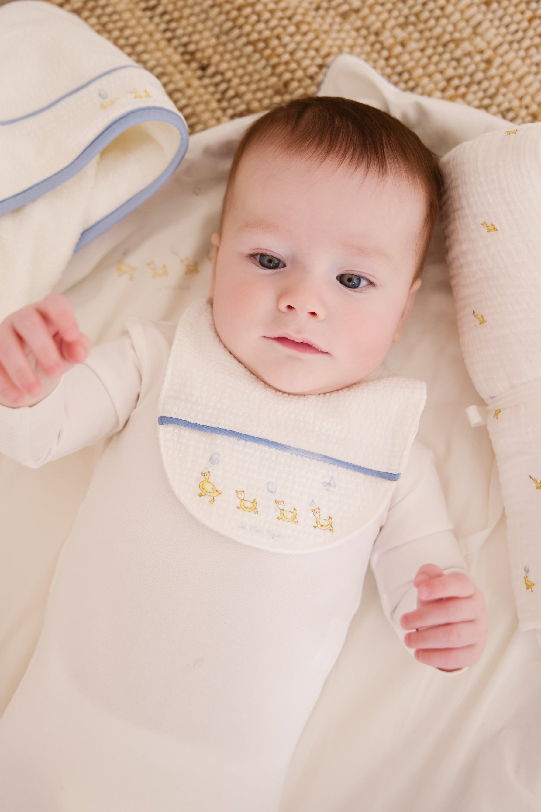 KIPP Collection Baby Bib With Blue Embroidered Detail And Snap Closure For Baby by KIPP™ Collection at Everetts Place