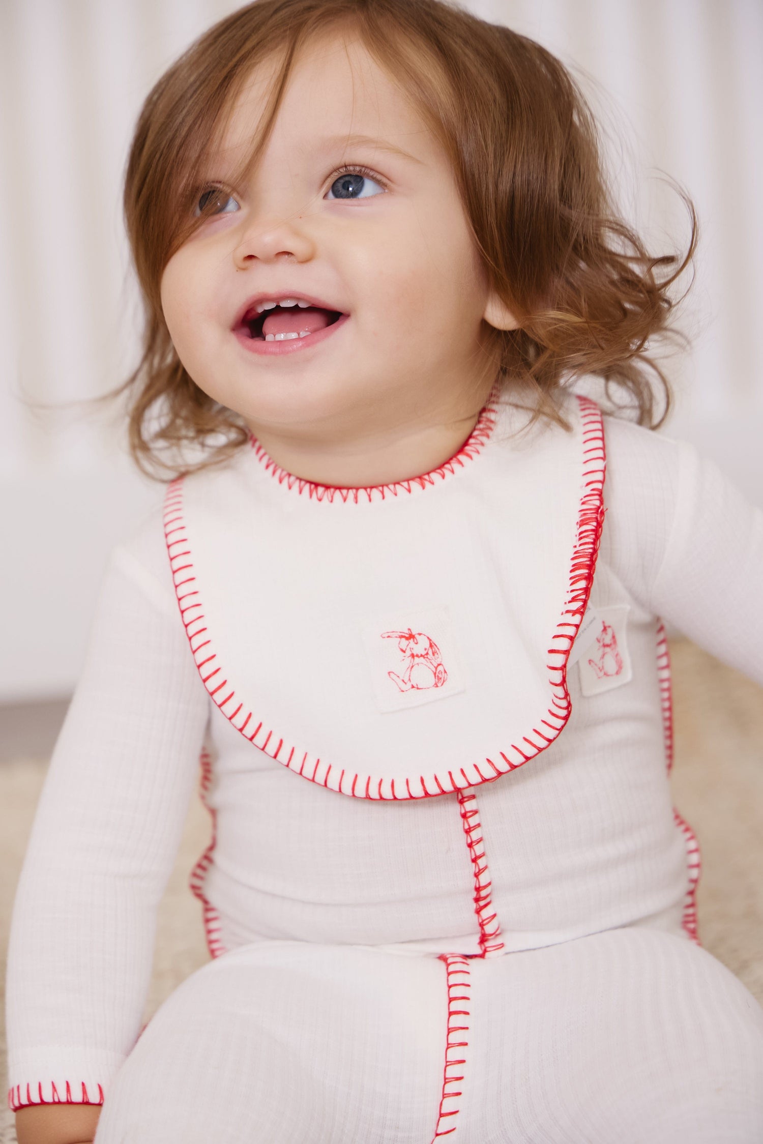 KIPP Collection Baby Bib Color Stitch Patch Detail And Snap Closure For Babies by KIPP™ Collection at Everetts Place