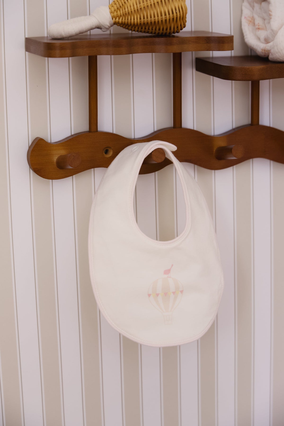 KIPP Collection Baby Bib with Pink Hot Air Balloon Graphic for Babies by KIPP™ Collection at Everetts Place
