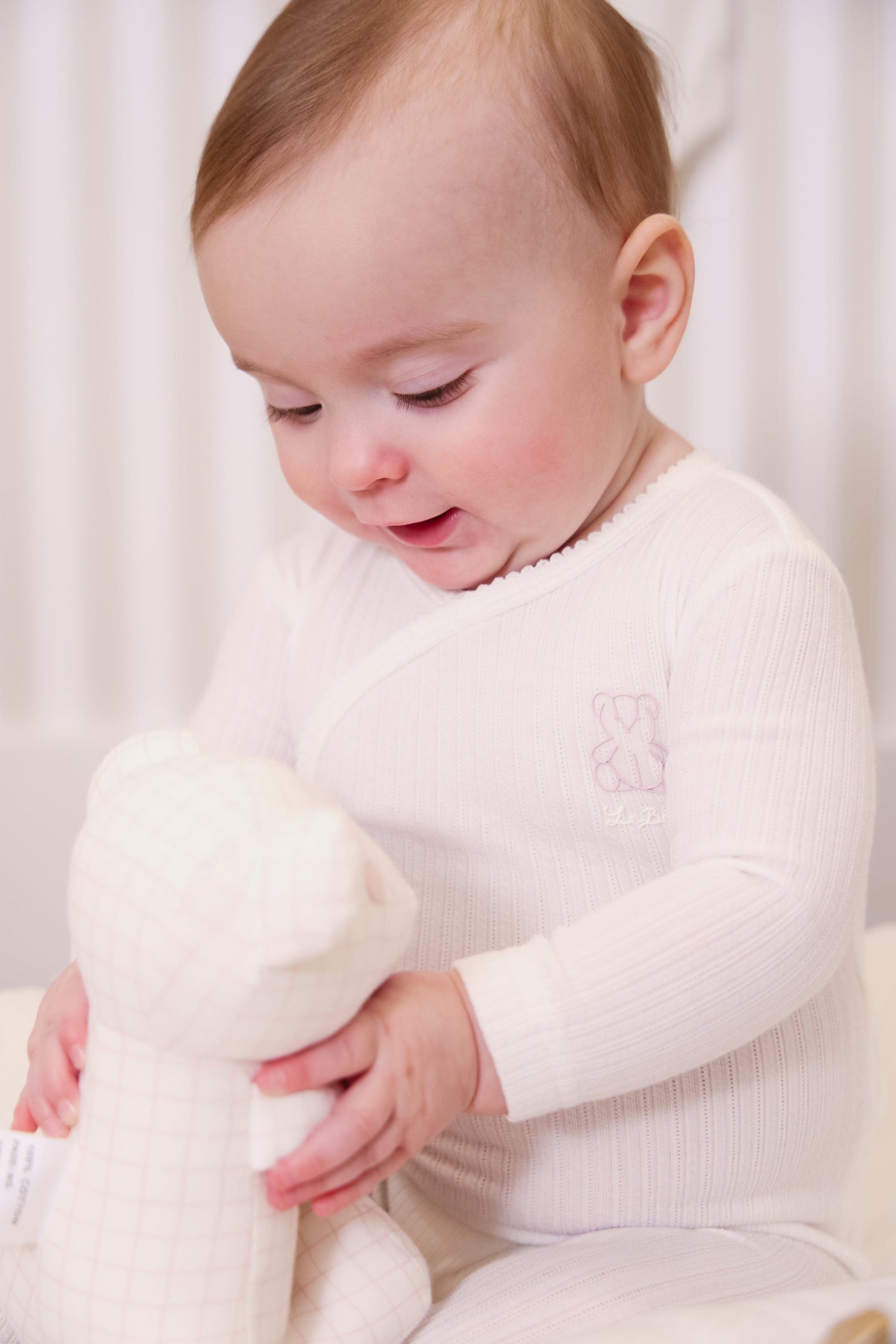 KIPP Collection Plush Teddy Bear with Grid Print and Wooden Ring for Babies by KIPP™ Collection at Everetts Place