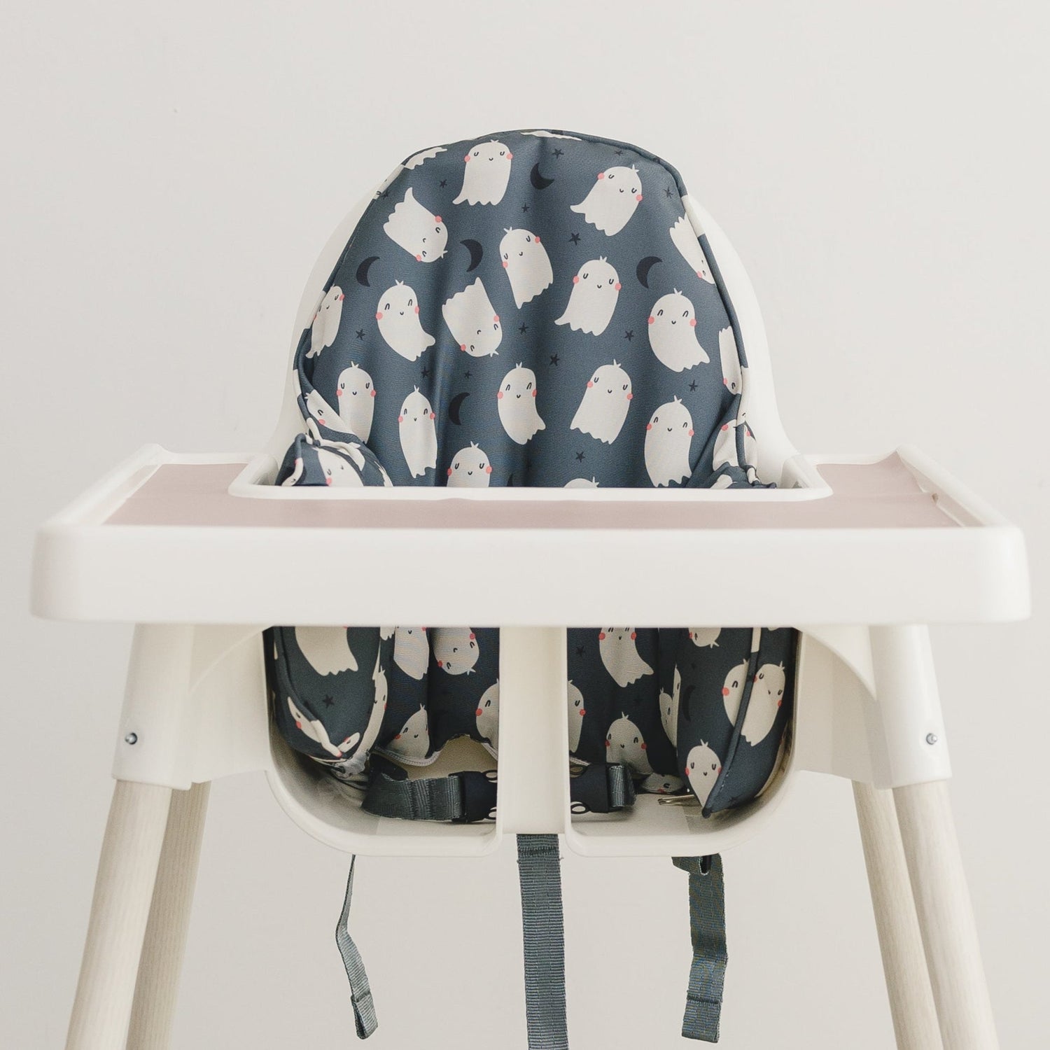 Cushion cover with black ghost print sized for an IKEA Antilop highchair