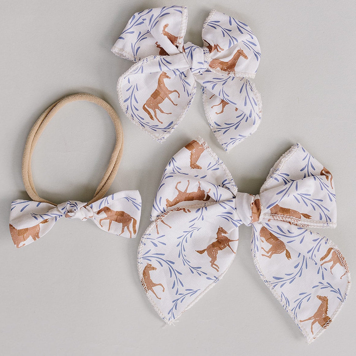 Pony-themed handcrafted fabric hair bow for babies