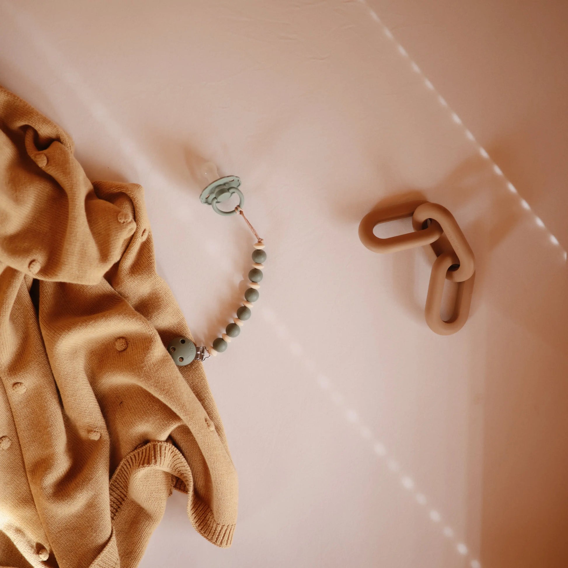 Links Teether Made from Food Grade Silicone for Sore Gums Relief and Comfort Mushie Everetts Place: Online Boutique