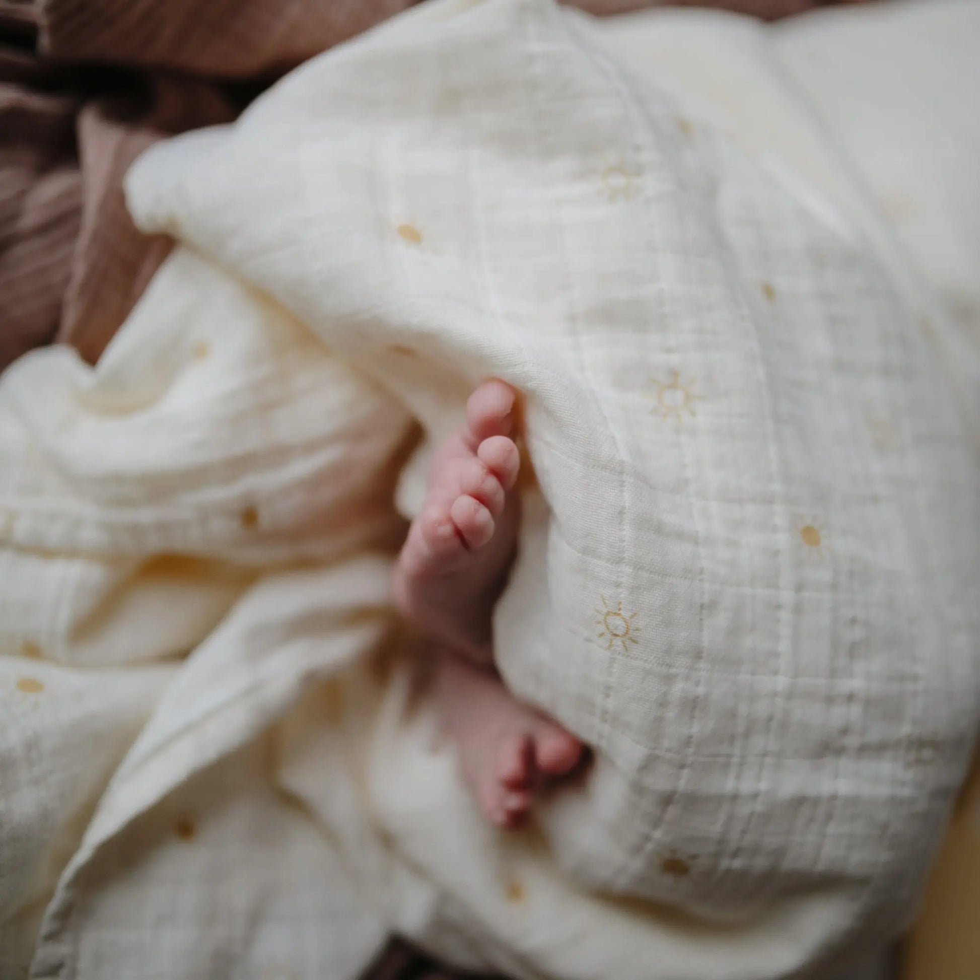 Organic Cotton Muslin Swaddle Blanket for Baby Cuddling and Nursing Mushie