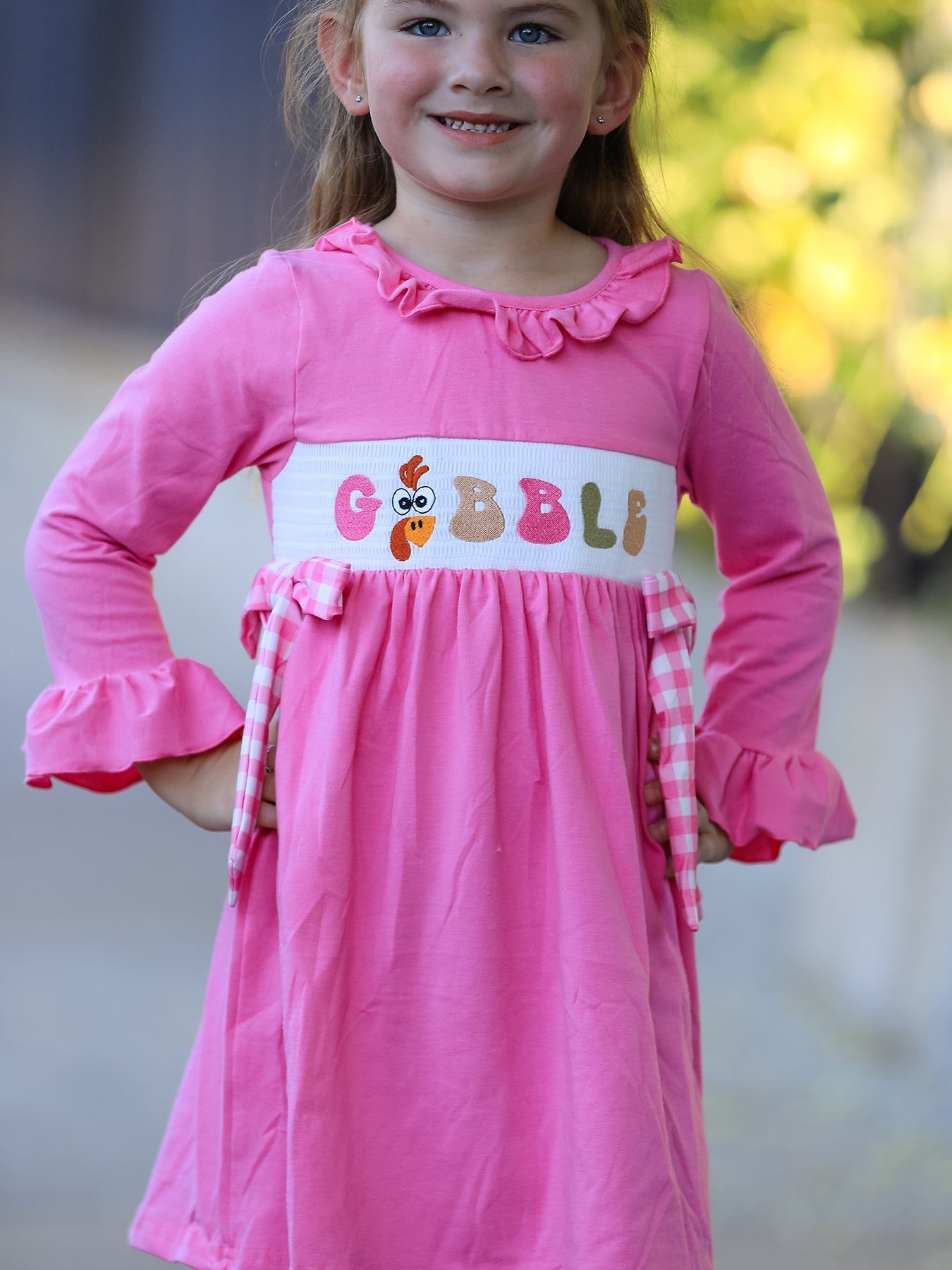 Baby girl dress with smock embroidery spelling Gobble across the chest, made for fall Thanksgiving gatherings