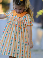 Girls dress in floral stripe print with a petals collar and smocked bodice detailing