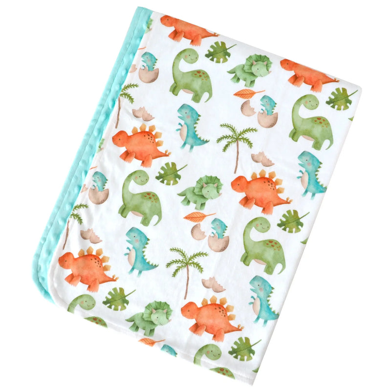 Premium baby and toddler minky blanket with colorful dinosaur pattern.