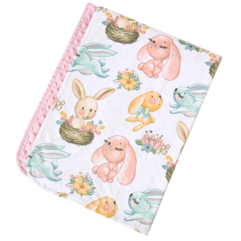 Baby & Toddler Minky Blanket with cute bunny pattern and pink textured back.