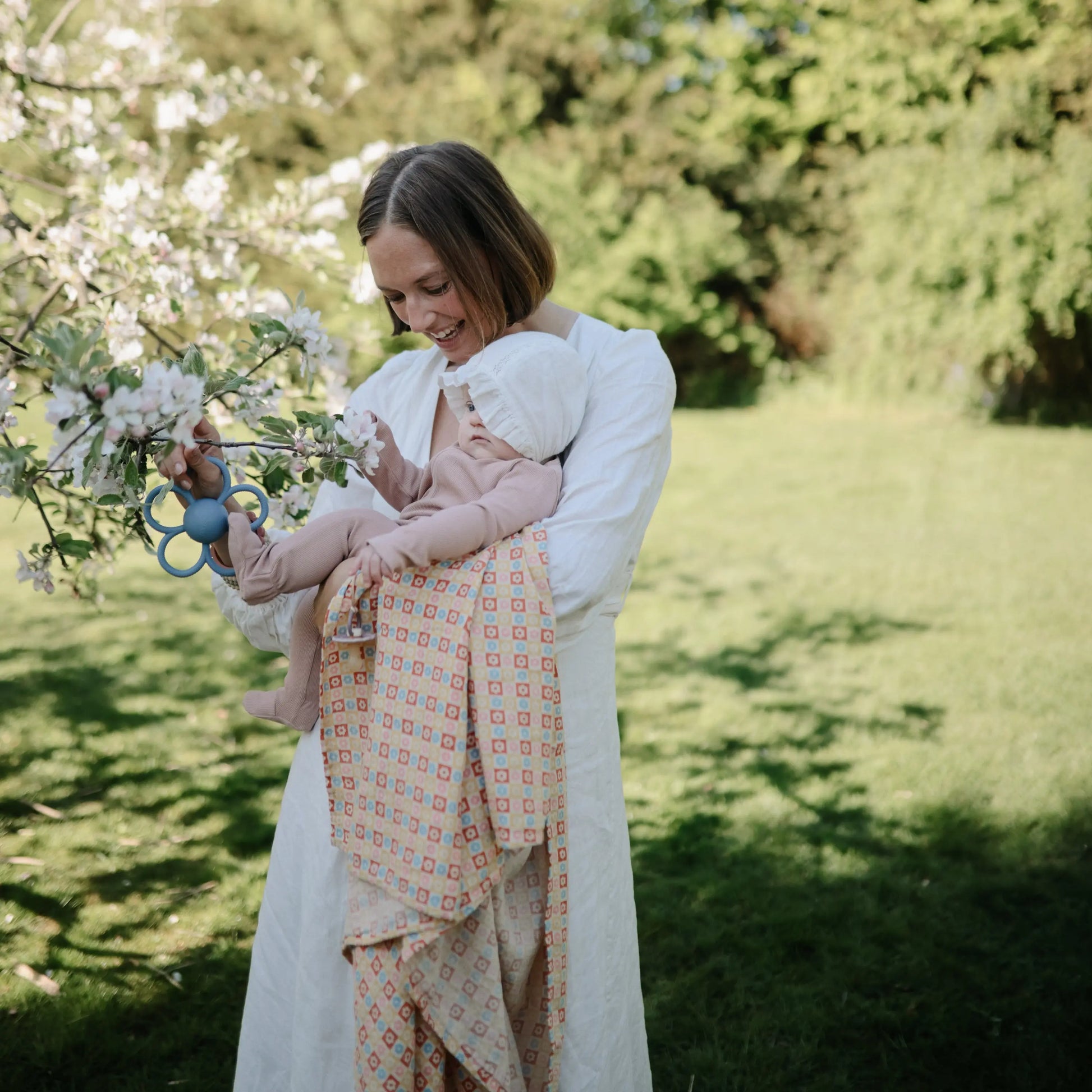 Organic Cotton Muslin Swaddle Blanket for Baby Cuddling and Nursing Mushie