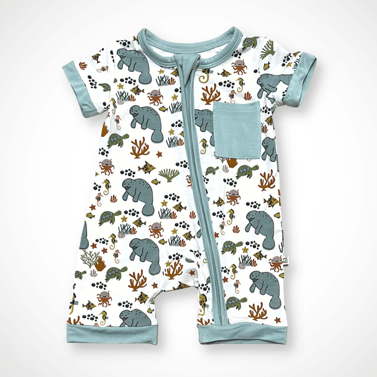Short-sleeve baby shorty romper with an all-over manatee print in soft bamboo fabric