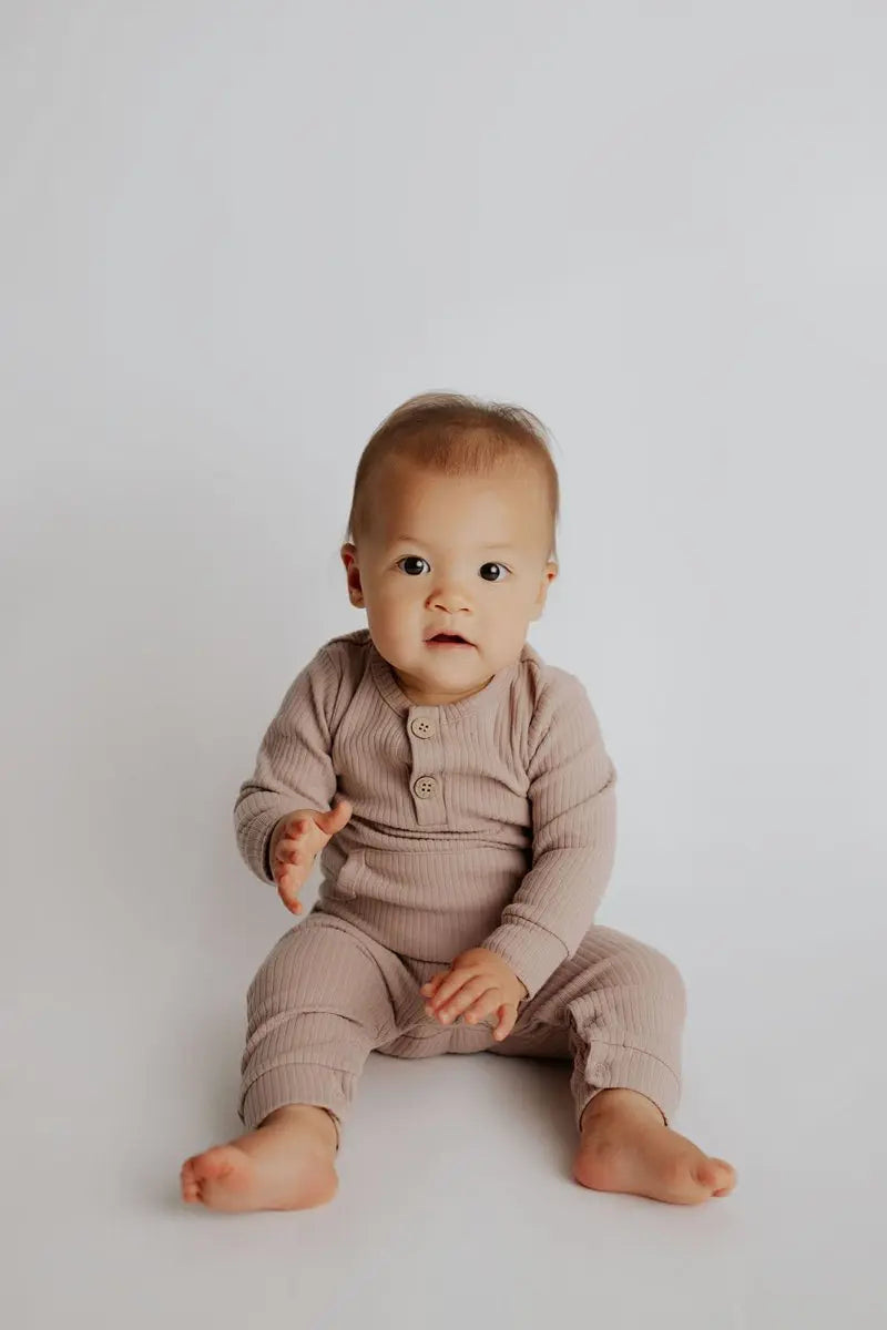 Three Little Tots Mauve Baby Ribbed Playsuit with pockets - 