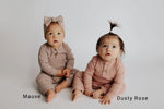 Three Little Tots Mauve Baby Ribbed Playsuit with pockets - 