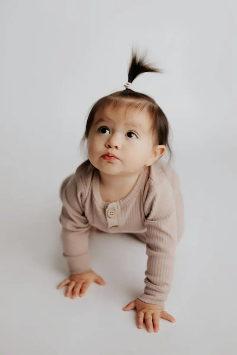Three Little Tots Mauve Baby Ribbed Playsuit with pockets - 