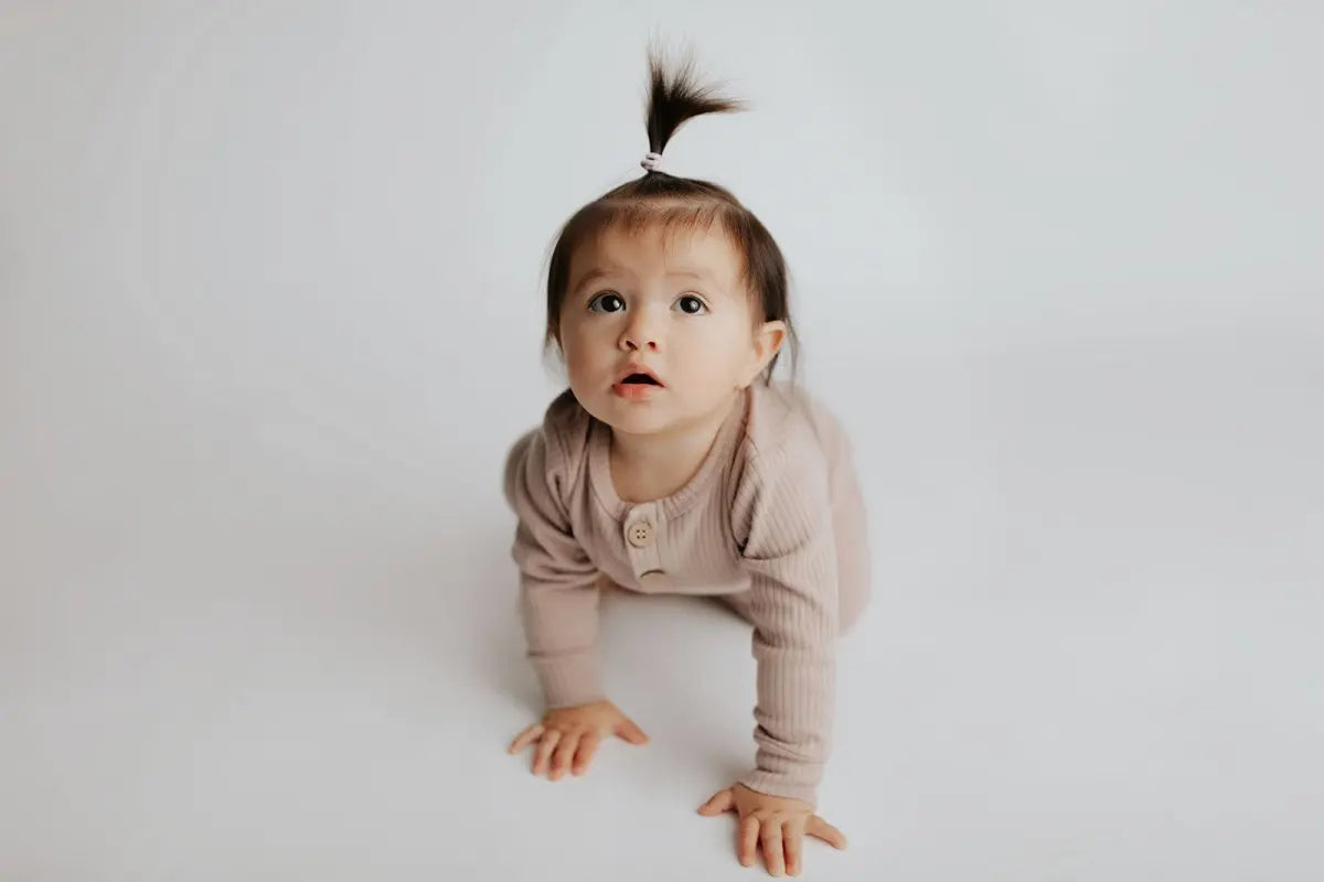 Three Little Tots Mauve Baby Ribbed Playsuit with pockets - 