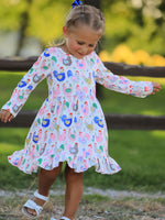 Long-sleeve girls twirl dress with colorful rooster and hen farm print and a ruffle hem.