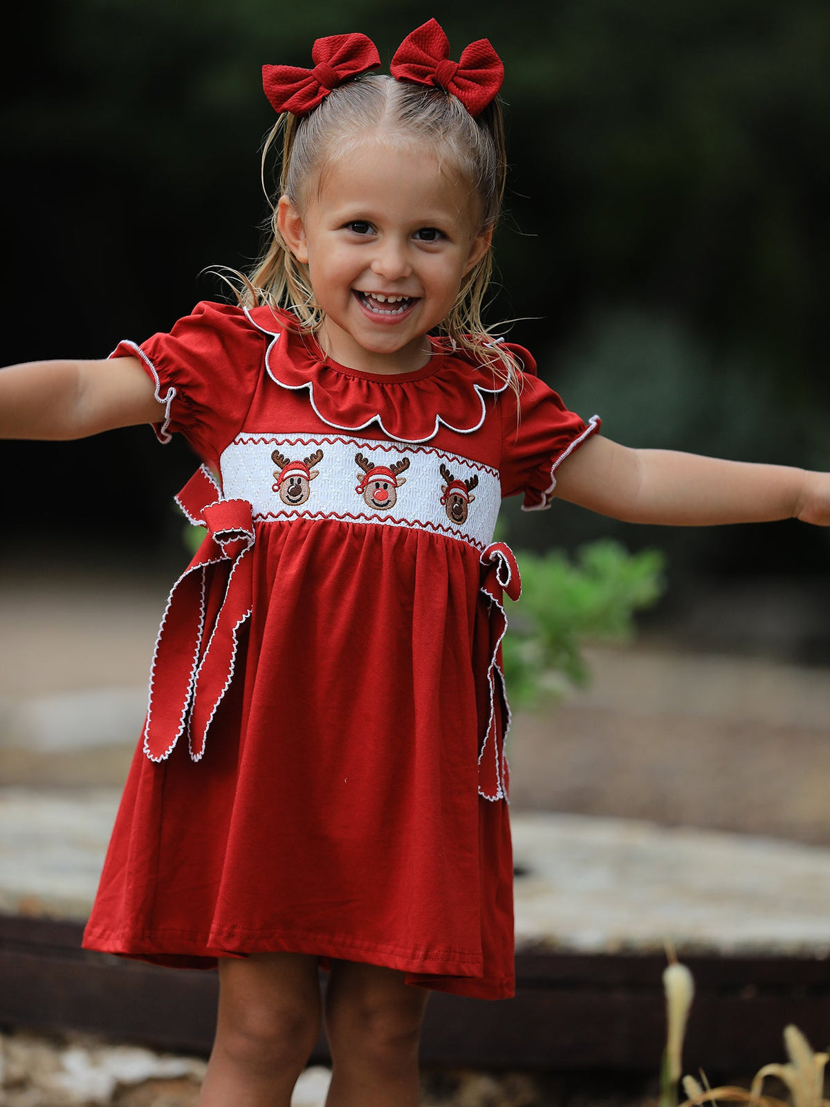 Girls Christmas Reindeer Smocked Red Bow Dress by Rylee Faith Designs