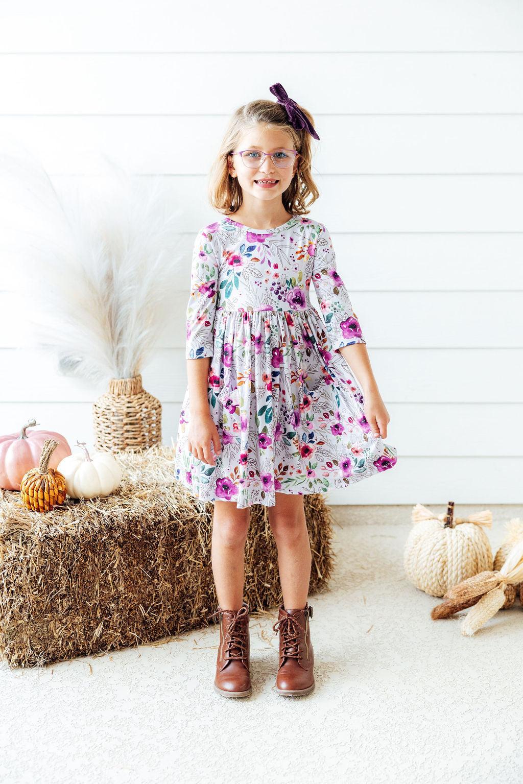 Midnight Rain 3/4 sleeve twirl dress with a full skirt, pockets, and a ballet neckline