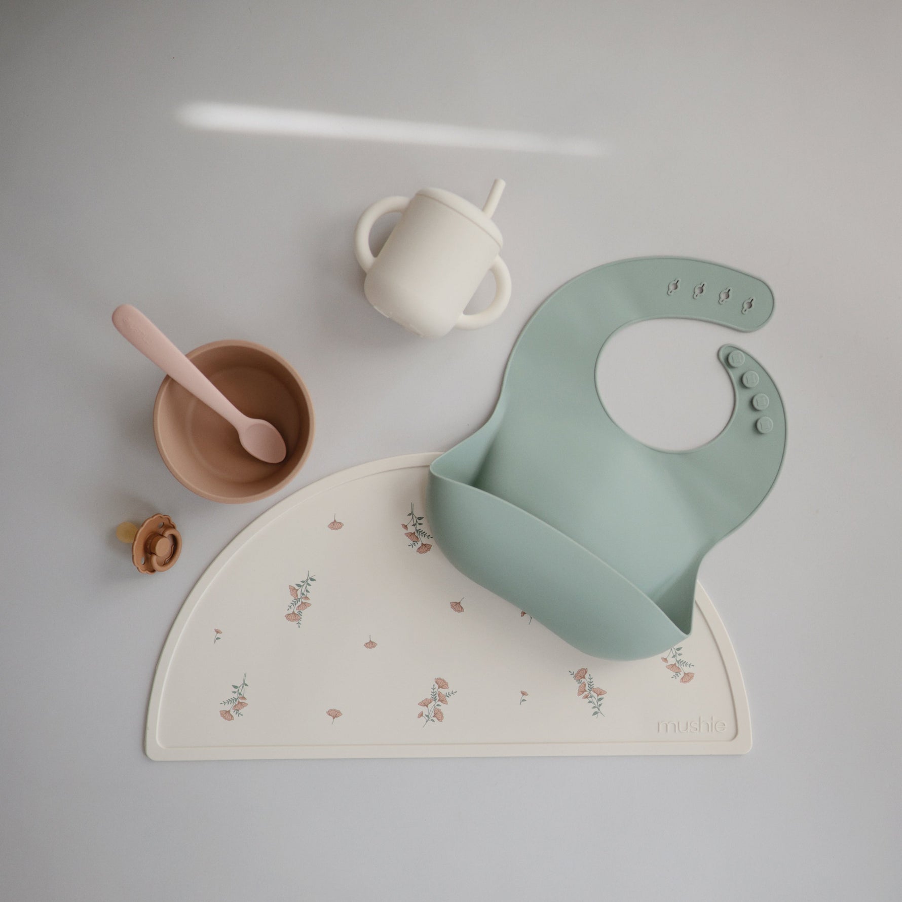 Mushie silicone placemat, non-slip baby feeding mat.