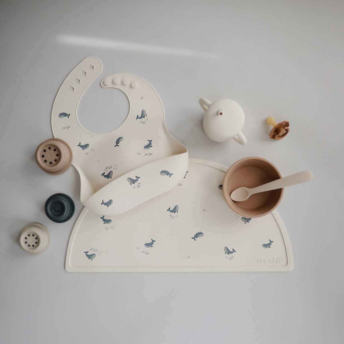 Mushie food-grade silicone placemat, non-slip for babies.