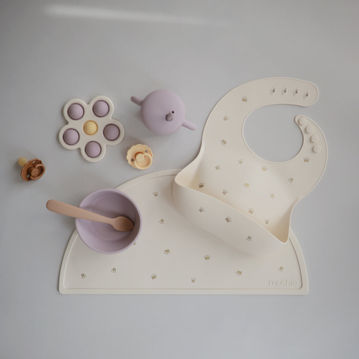 Mushie silicone placemat, non-toxic and easy-clean for baby feeding.