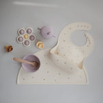 Mushie silicone placemat, non-toxic and easy-clean for baby feeding.