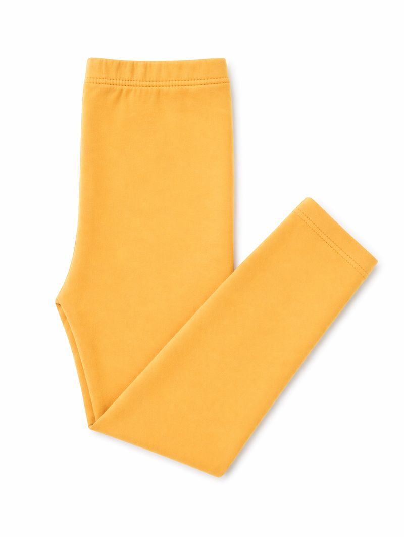 Mila & Rose organic baby mustard leggings, soft and stretchy.