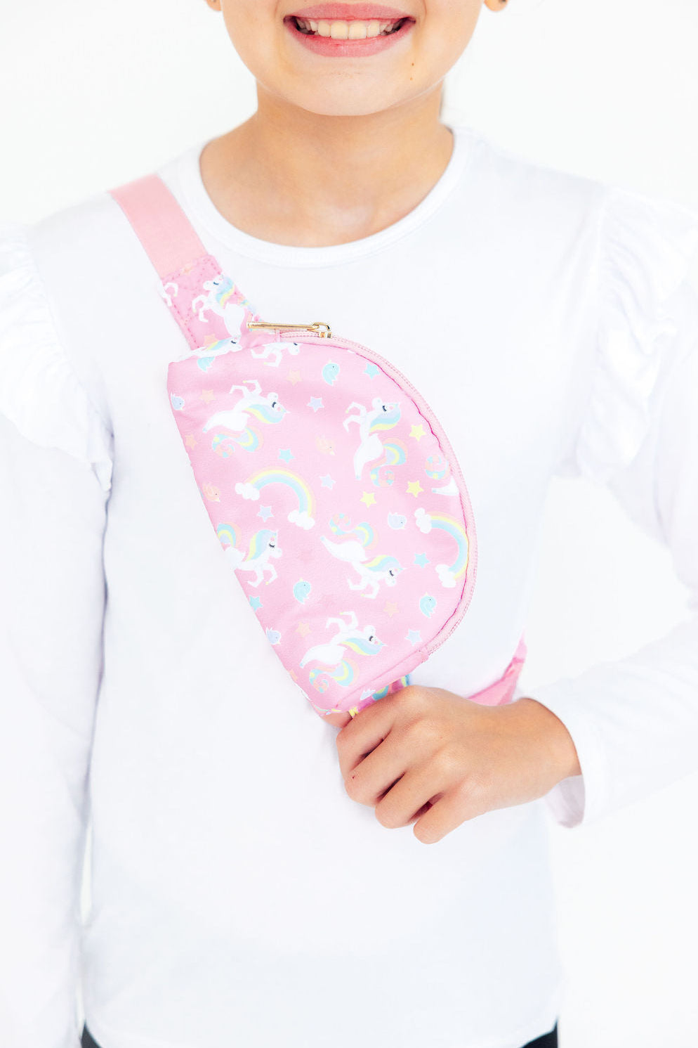 Unicorn-themed belt bag with adjustable strap for wearing at the waist or cross body