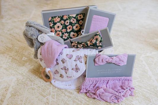 Welcome Baby Girl Flowers and Butterfly Gift Basket with Bamboo Blanket Floral Headband Swaddle Bib Teether and Plush Rabbit Newcastle Classics
