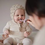 Mushie Flower Training Toothbrush for Kids - Soft Silicone Bristles for Gentle Cleaning and Gum Stimulation - Baby & Toddler Training Toothbrush