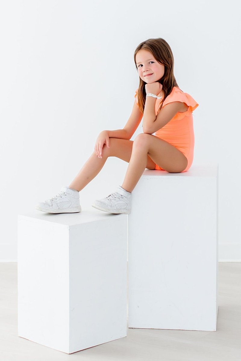 Mila & Rose ® Neon Coral Short Sleeve Flutter Leotard For Girls Dance - Everetts Place Boutique - 