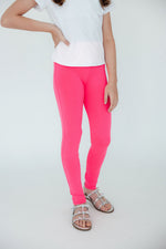 Mila & Rose vibrant neon pink organic baby leggings.