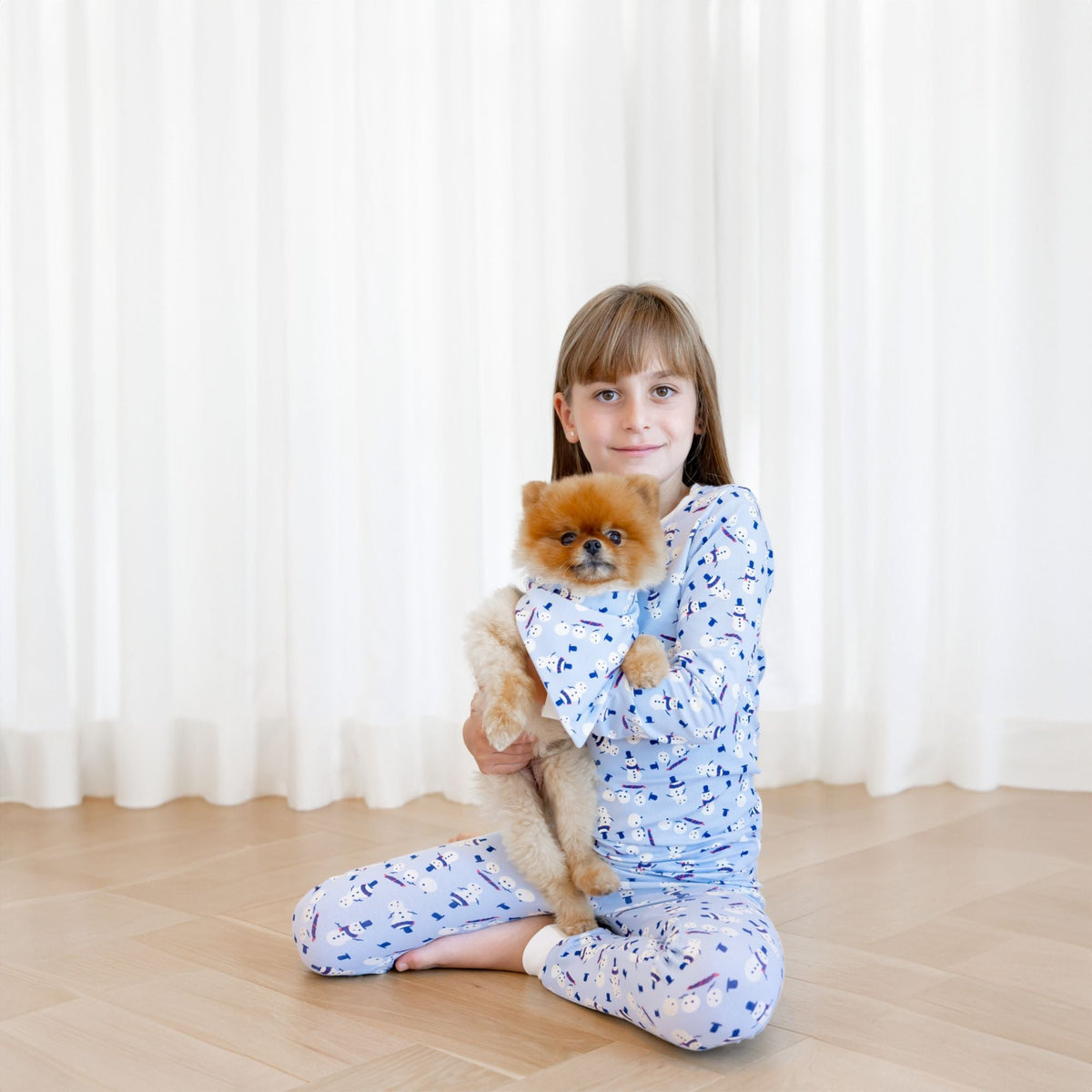 Norani Baby organic kids pajamas, winter snowman holiday print.